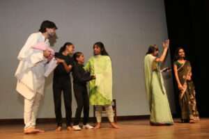 children are acting on stage